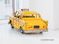 Mobile Preview: Handgefertigtes Modellfahrzeug Retro Taxi schwarz/gelb aus Metall (27 cm)